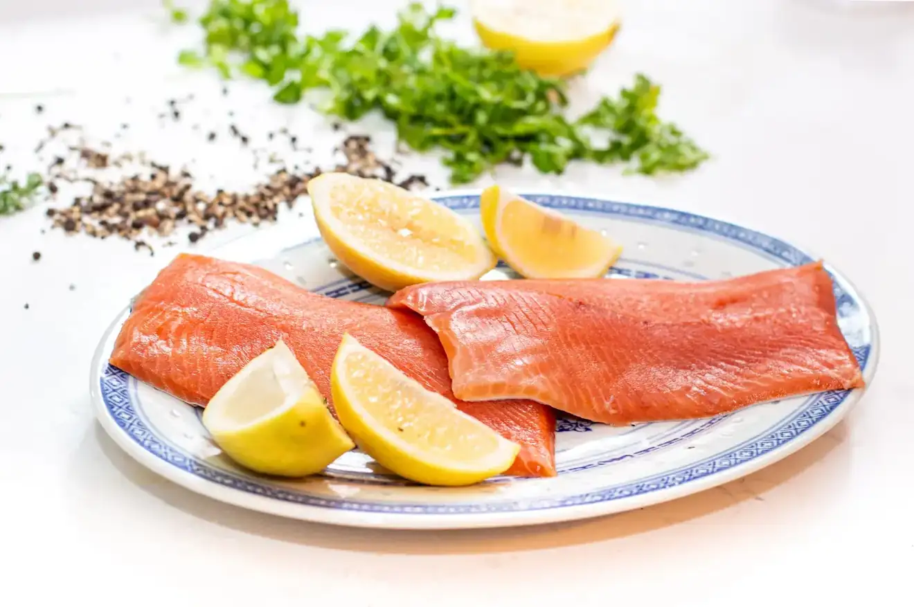 Fresh rainbow trout fillets with lemon